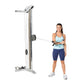 Hoist V series cable exercise machine with woman in blue shorts and light blue tank top demonstrating lat pulldown movement o