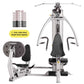 Hoist V1-Elite home gym with silver frame, black padded seats and handles, featuring dual workout stations and 1-50 lb silent