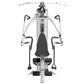 Hoist V4-Elite home gym with silver frame, black seat and handles, dual cable arms, and foot pedals, overhead view on white b