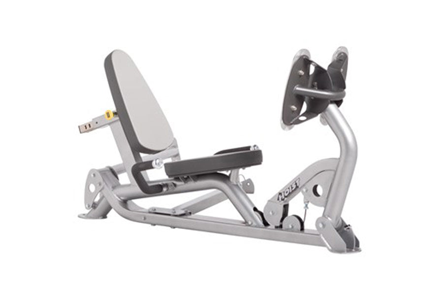 Hoist Freestanding Leg Press Kit with gray frame, black padded seat and backrest, silver handles on white background