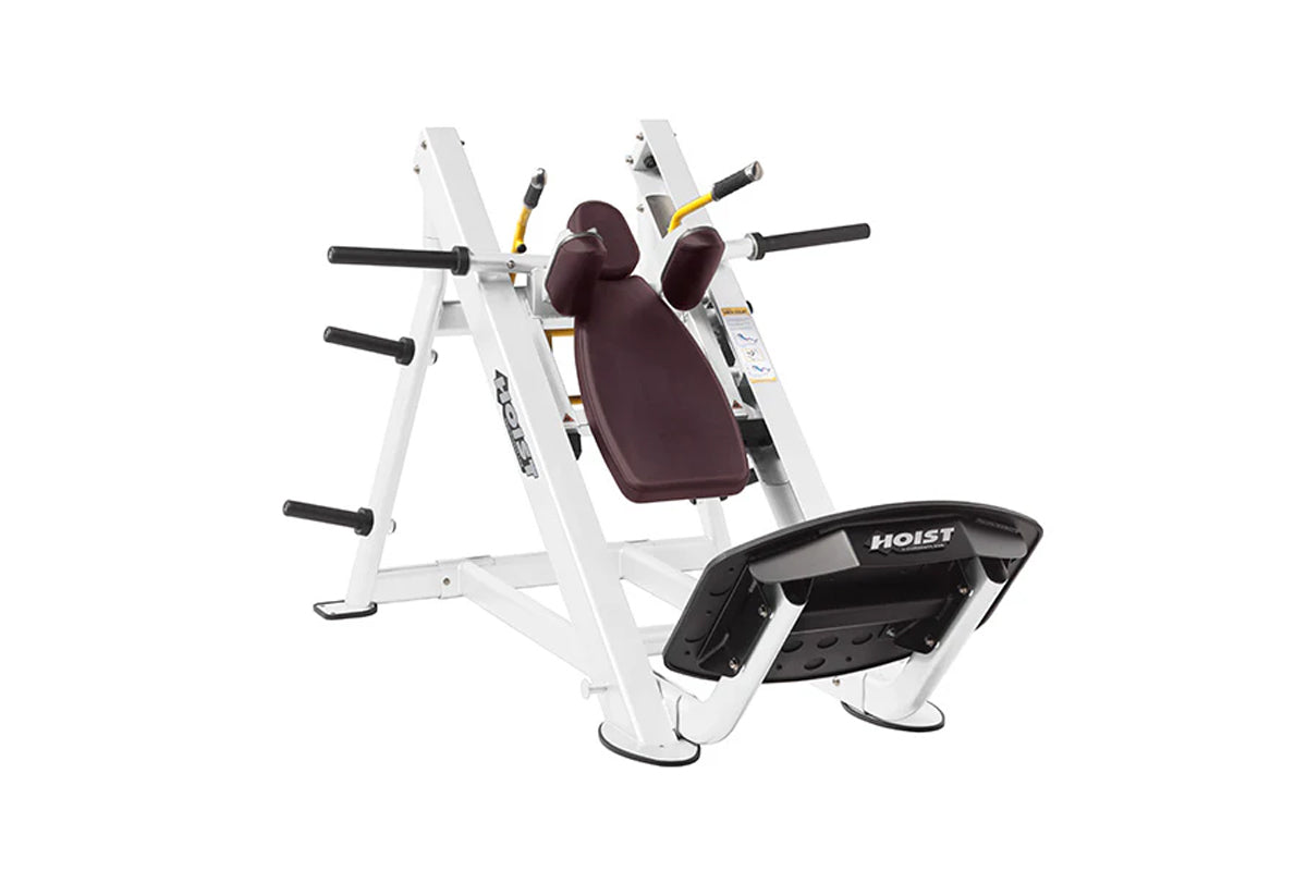Hoist Hack Squat machine with white frame, burgundy padded seat, black handles and footplate on white background