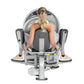 Woman using gray and lavender leg press machine with foot pedals, viewed from above, on white background