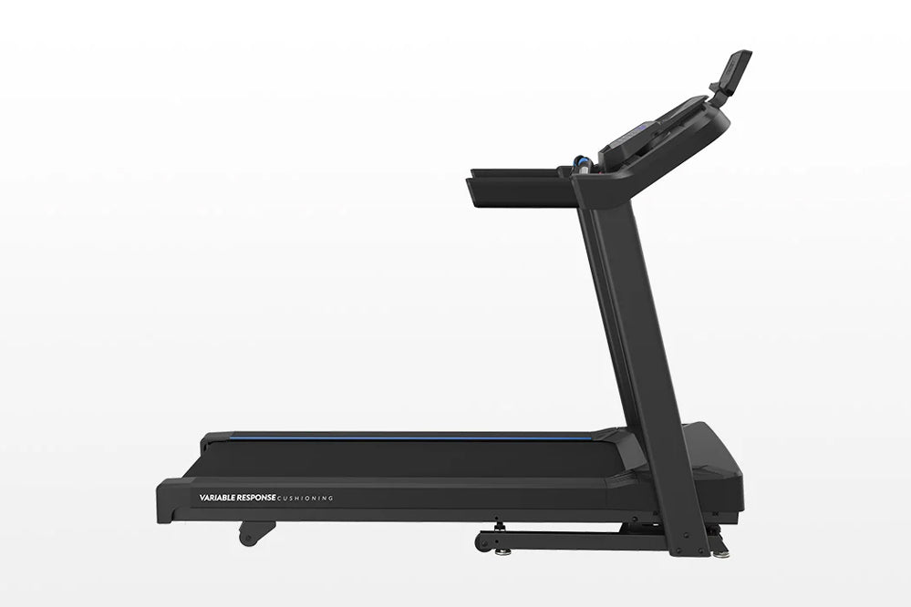 Black Horizon 5.0 AT treadmill with cushioned running belt, upright handrail, and digital display console on white background