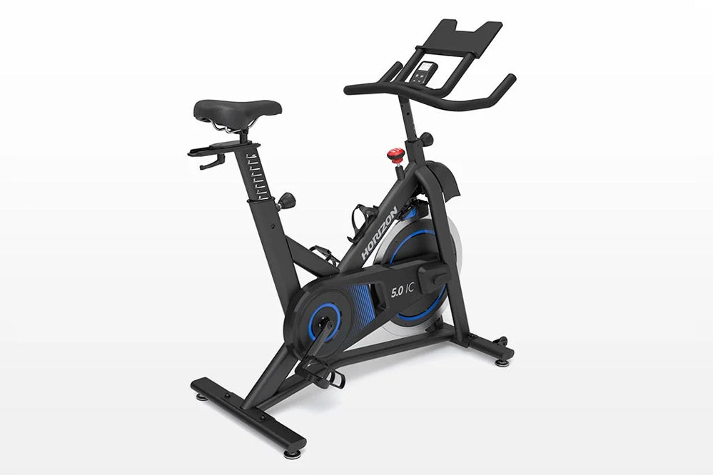 Horizon 5.0 IC indoor cycle with black frame, blue accents, digital display console, adjustable seat and handlebars on white 