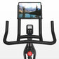 Black indoor stationary bike with tablet holder displaying mountain landscape, digital console showing metrics, and curved ha