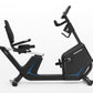 Horizon 5.0 R black recumbent exercise bike with blue accent stripe and digital console, side view on white background