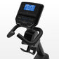 Black recumbent exercise bike with blue digital display console showing workout metrics and data, curved handlebars, and peda