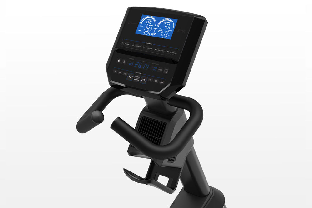 Black recumbent exercise bike with blue digital display console showing workout metrics and data, curved handlebars, and peda