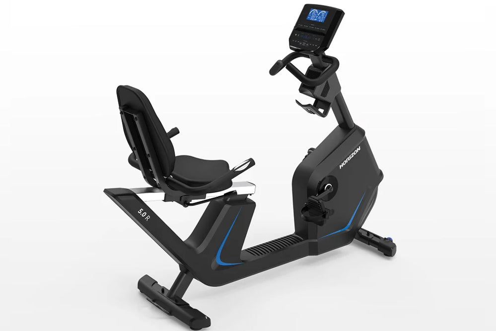 Black recumbent exercise bike with blue accent trim, blue digital display console, and padded seat with backrest on white bac