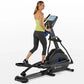 Woman wearing lime green tank top and black capris using black and blue Horizon 7.0 AE elliptical with digital display consol