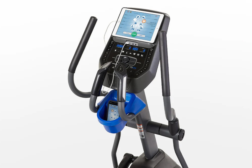 Horizon 7.0 AE elliptical machine with black frame, blue foot pedals, and tablet display showing workout metrics on white bac