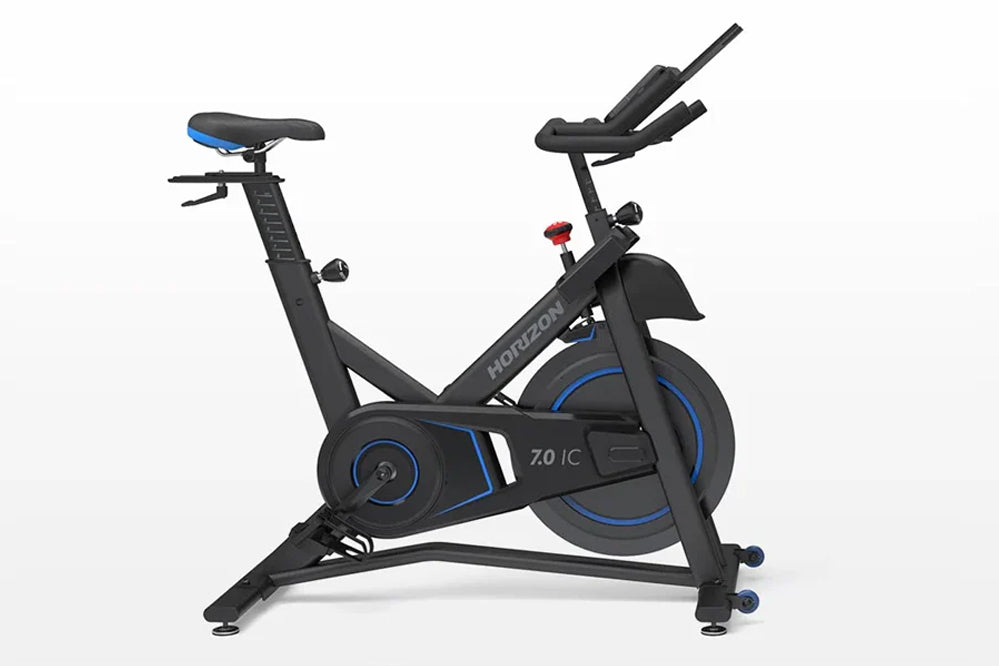 Horizon 7.0 IC black and blue indoor stationary exercise bike with padded seat, handlebars, and flywheel on white background