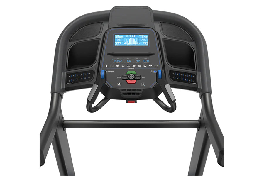 Black treadmill console with blue LCD display showing workout data, dual handle grips, and control buttons on white backgroun