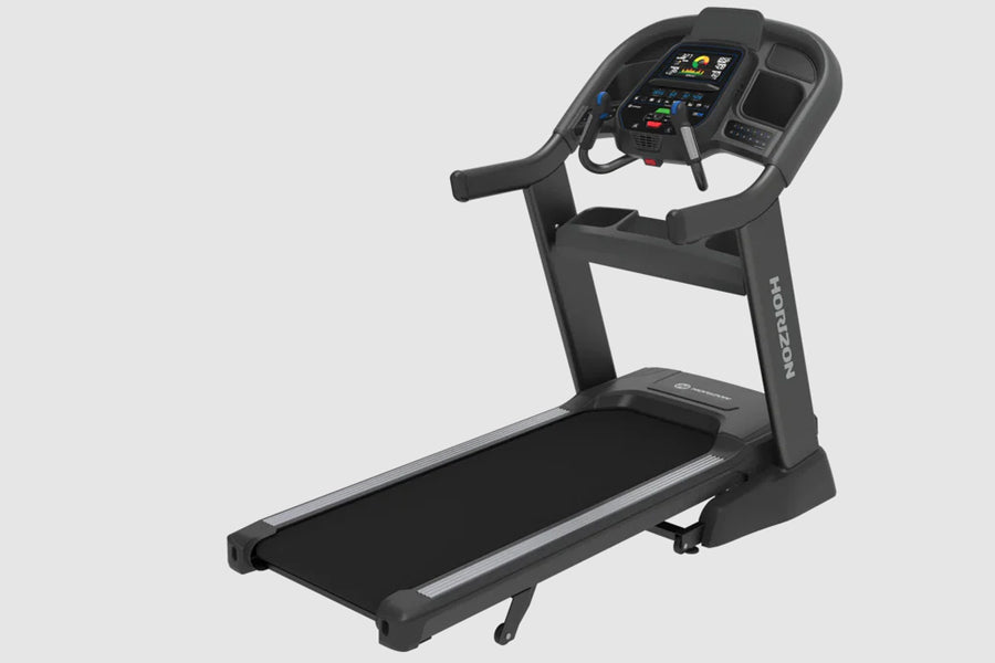Black Horizon 7.8 AT treadmill with digital display console, handrails, and black running belt on white background