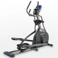 Horizon EX-59 elliptical machine with gray frame, blue accents, digital display console, and dual handlebar grips on white ba