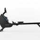 Horizon Oxford 6 black rowing machine with extended rail and foot pedal in raised position, shown on white background