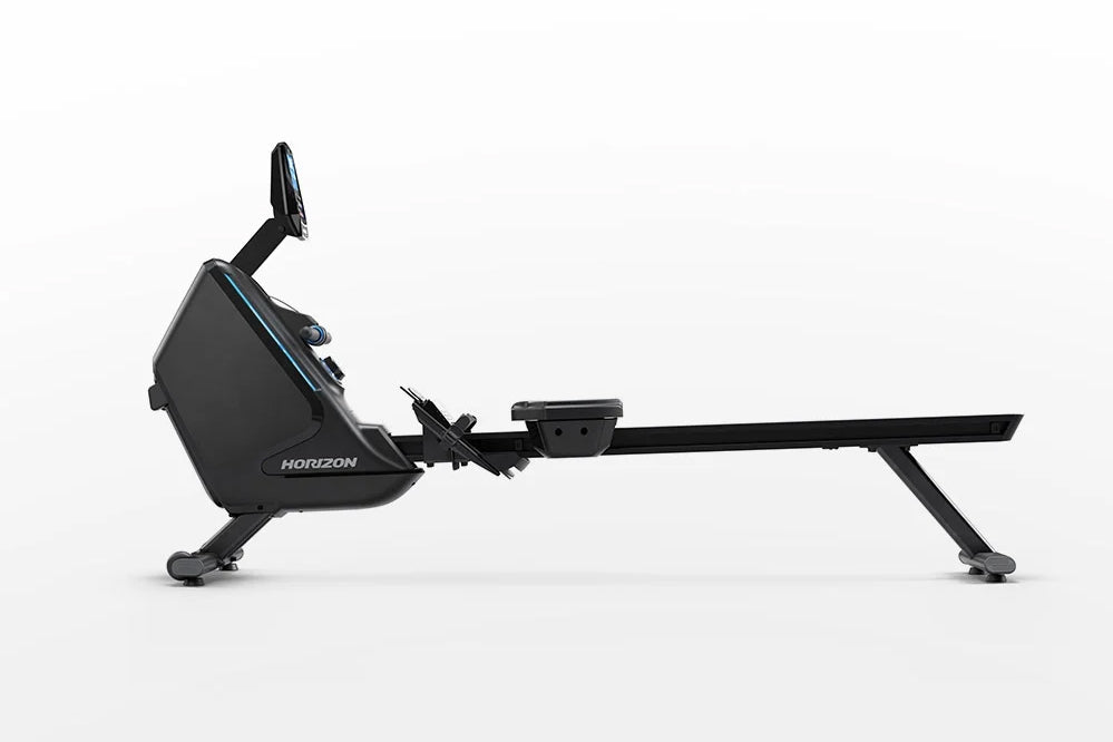 Horizon Oxford 6 black rowing machine with extended rail and foot pedal in raised position, shown on white background