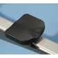 Black padded seat with silver metal rail on blue background