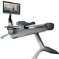 Hydrow Origin gray rowing machine with digital touchscreen displaying rowing workout video, on white background