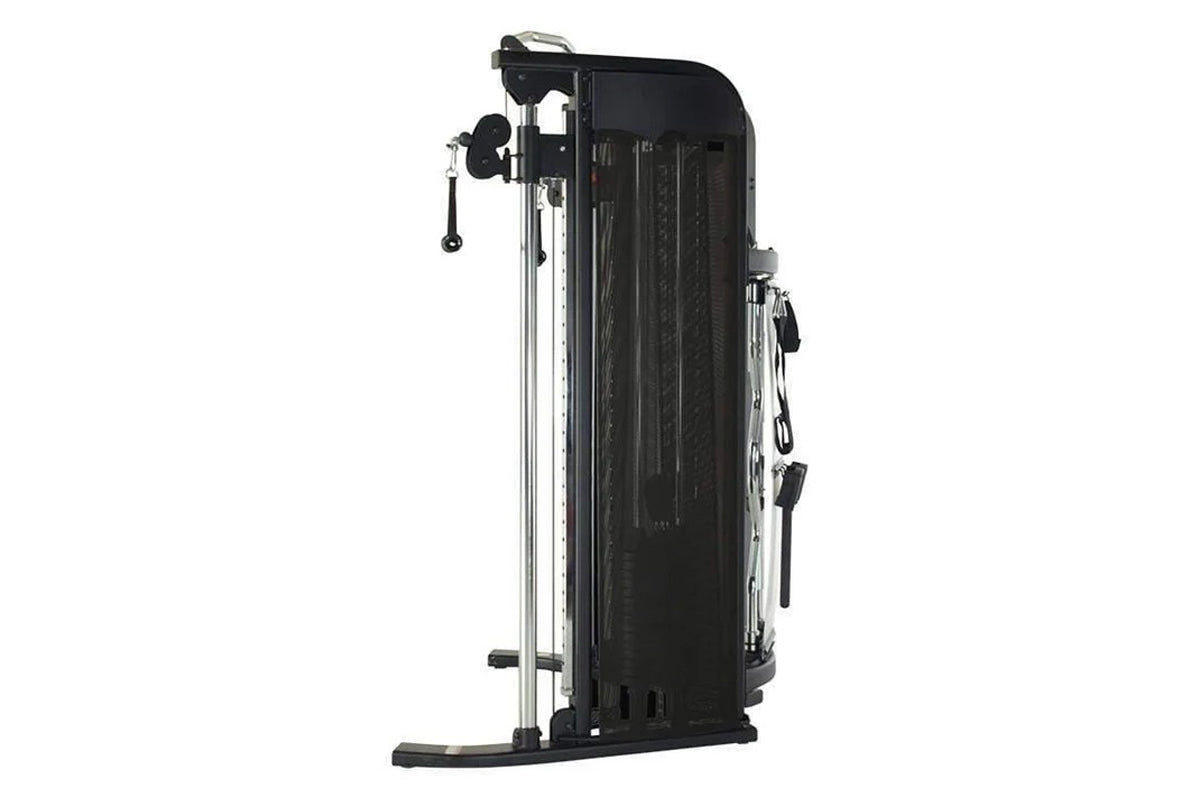 Black and silver Inspire Fitness FT1 functional trainer with dual cable towers and adjustable pulleys on white background