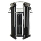 Black and gray dual-stack functional trainer with cable machines, weight plates, and overhead pulley system on white backgrou
