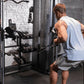 Man wearing light blue sleeveless tank top and gray shorts using Inspire Fitness FT2 Pro Smith Functional Trainer in gym with