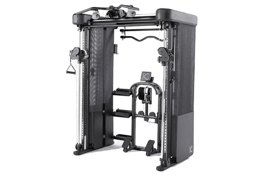 Black and silver Inspire Fitness FT2 Pro Smith functional trainer with dual weight stacks and foot platform on white backgrou
