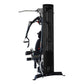 Black multi-gym system with dual weight stacks, lat pulldown and leg press attachments, on white background