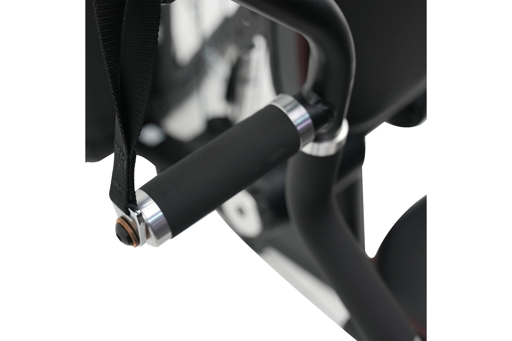 Black rubber dumbbell with metal collar and black nylon strap, shown hanging on multi-gym equipment
