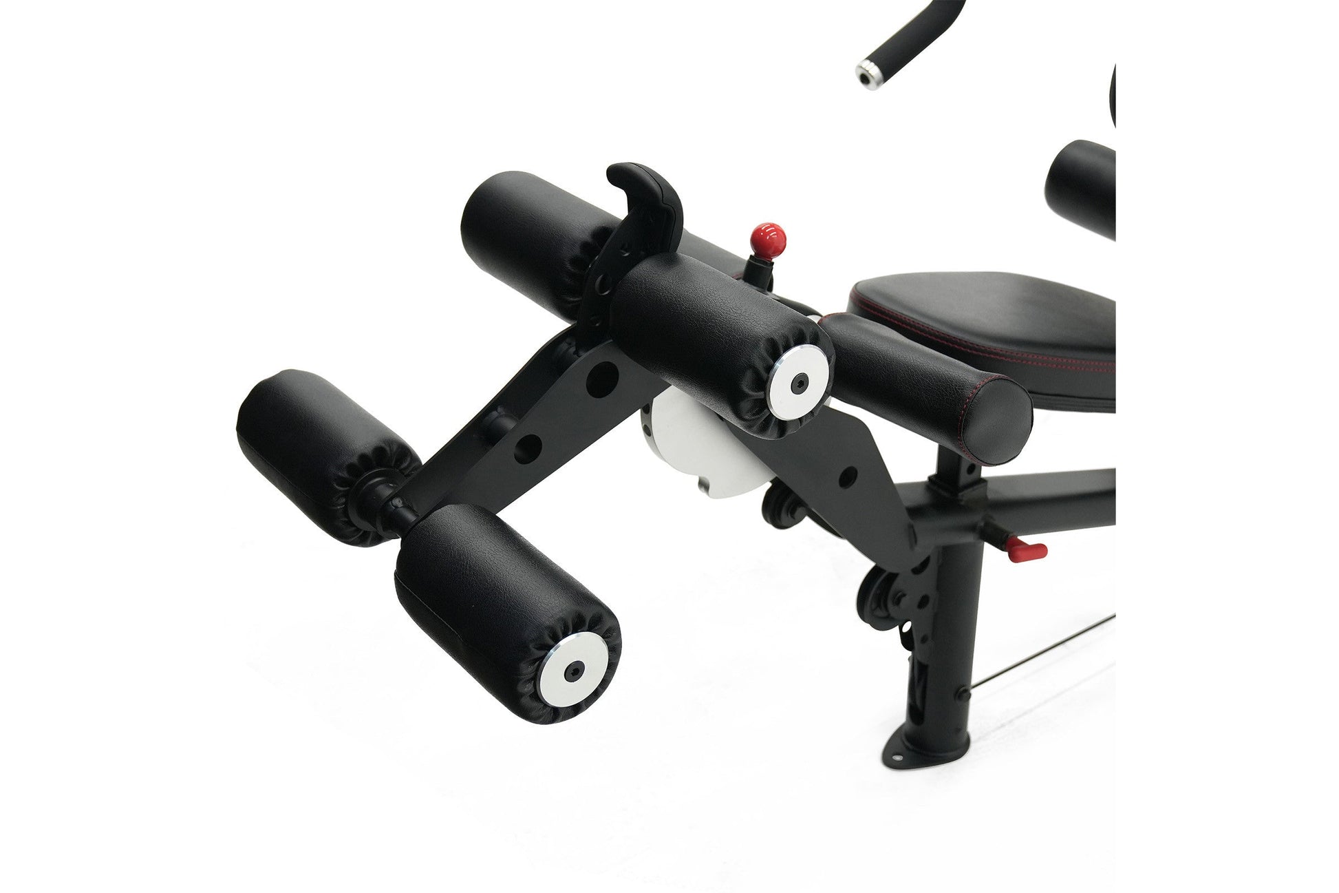 Black multi-gym system with padded leg extensions, adjustable seat with red accents, and handle bars on white background