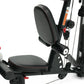 Black recumbent exercise bike with padded seat and backrest, red accents, and adjustable resistance cables on white backgroun