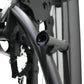 Black and gray multi-gym system detail showing metal frame tubing and adjustment strap mechanism against white background
