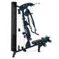 Dark blue and black multi-gym system with cable machine, leg press platform, and adjustable arms on white background