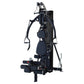 Black multi-gym system with padded seat, weight stack, and cable machine on white background