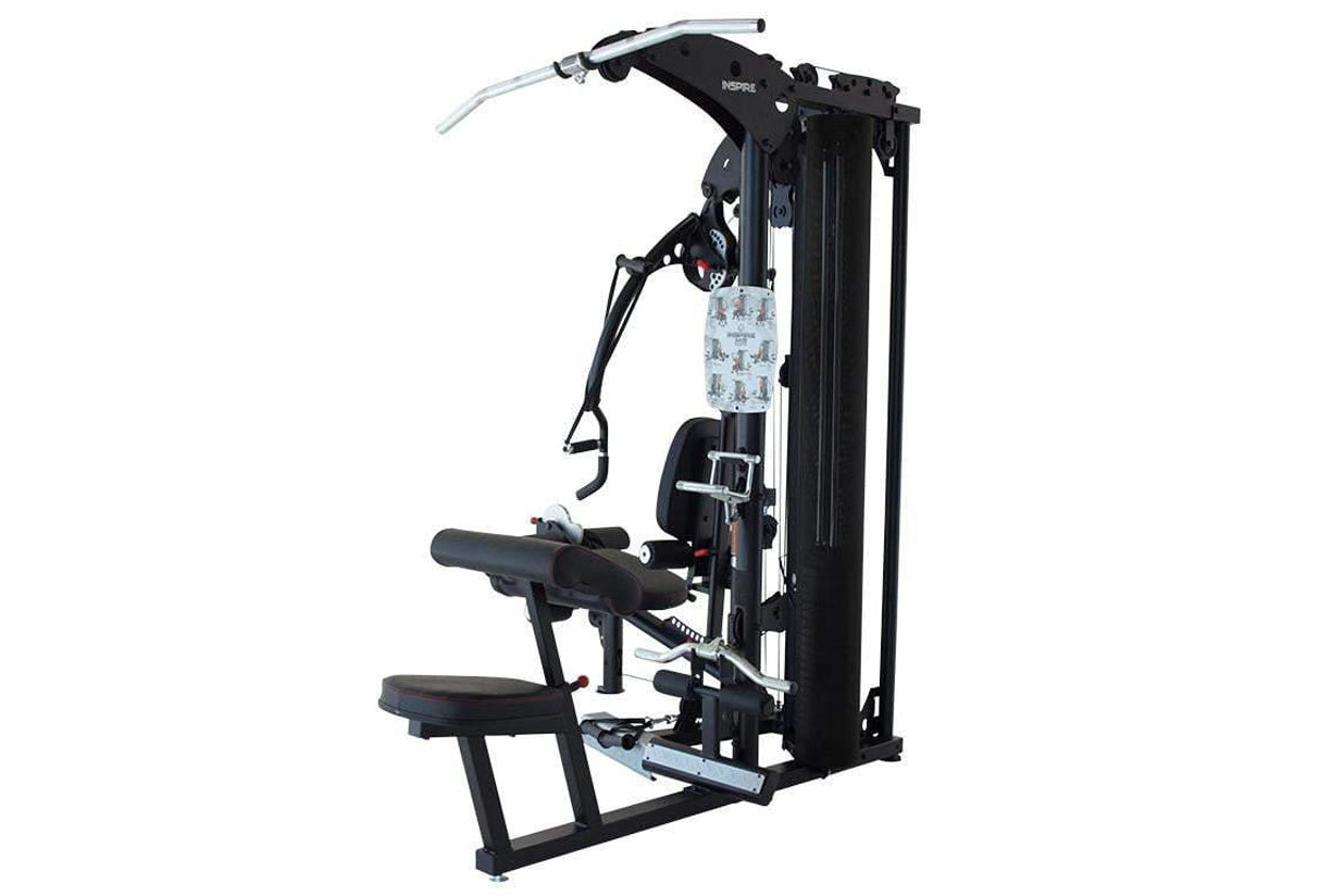 Black and silver multi-gym system with adjustable pulleys, seat, and leg press station on white background