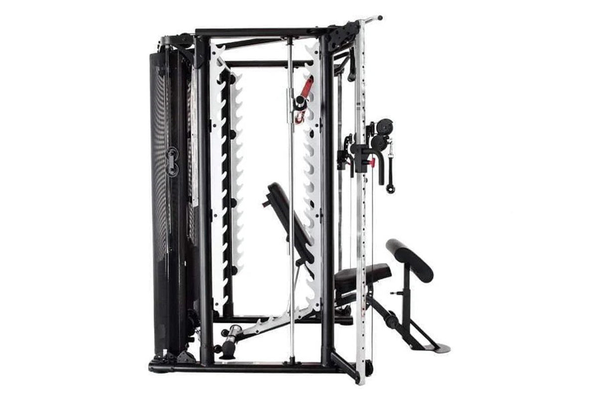 Inspire Fitness SCS Smith Cage System with black and white frame, cable attachments, and leg press attachment on white backgr
