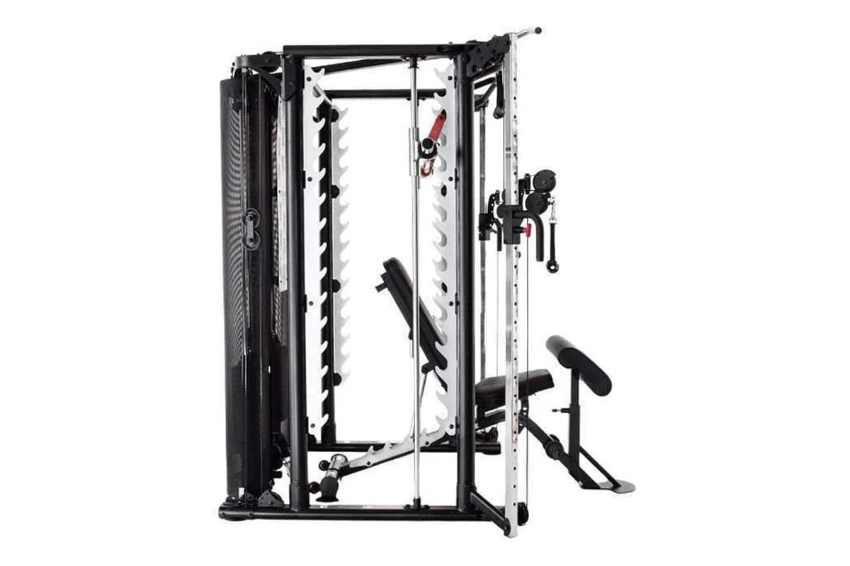 Black and white multi-function Smith cage system with cable attachments, bench, and weight pegs on white background
