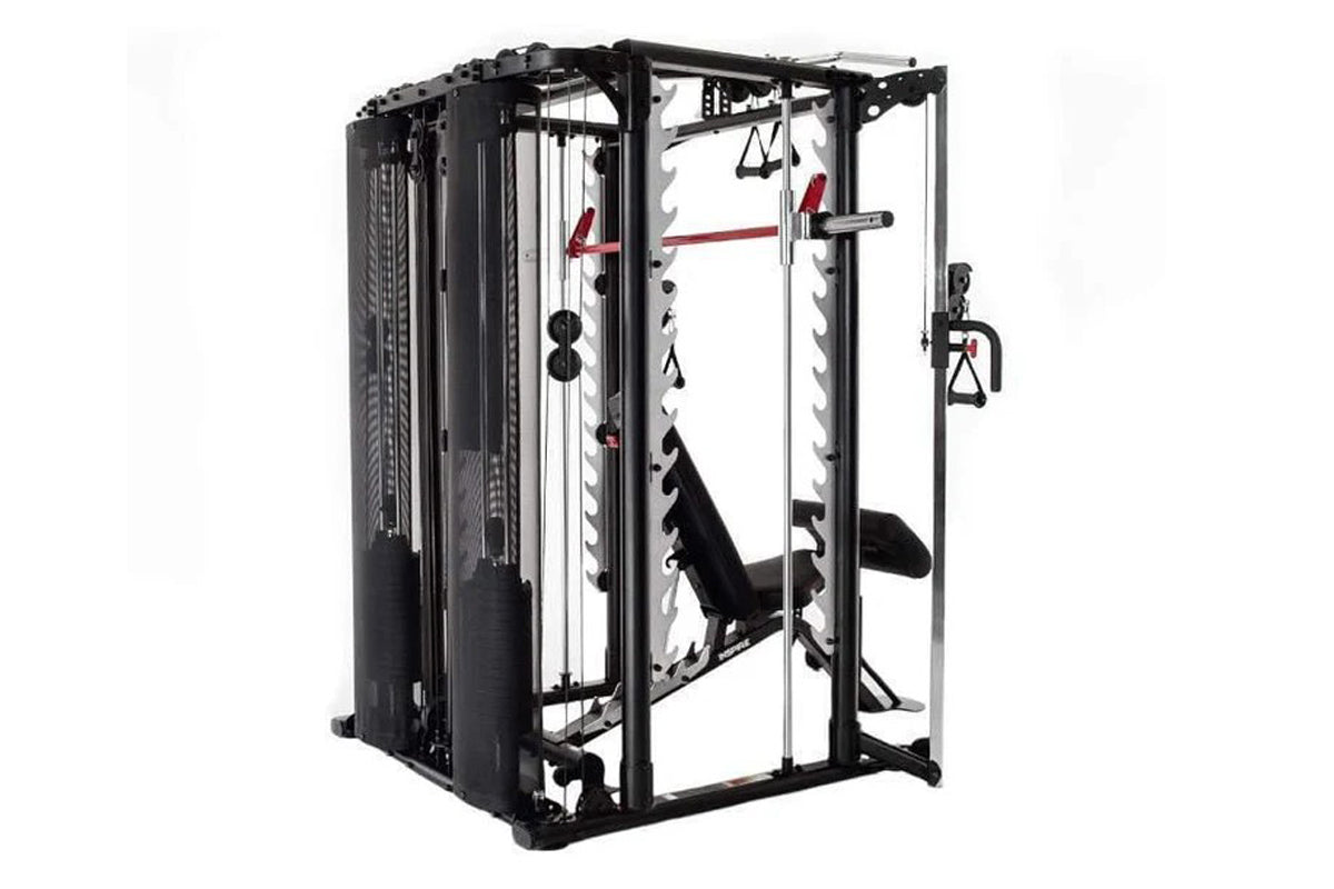 Black multi-station Smith cage system with cable pulleys, red bars, and weight stack, on white background