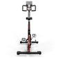 Keiser M3 Indoor Cycle with black and red frame, dual pedals with cages, gray seat and handlebar, digital console on white ba