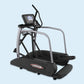 Landice E7 elliptical machine with black pedals, gray frame, digital console display, and handles on light blue background