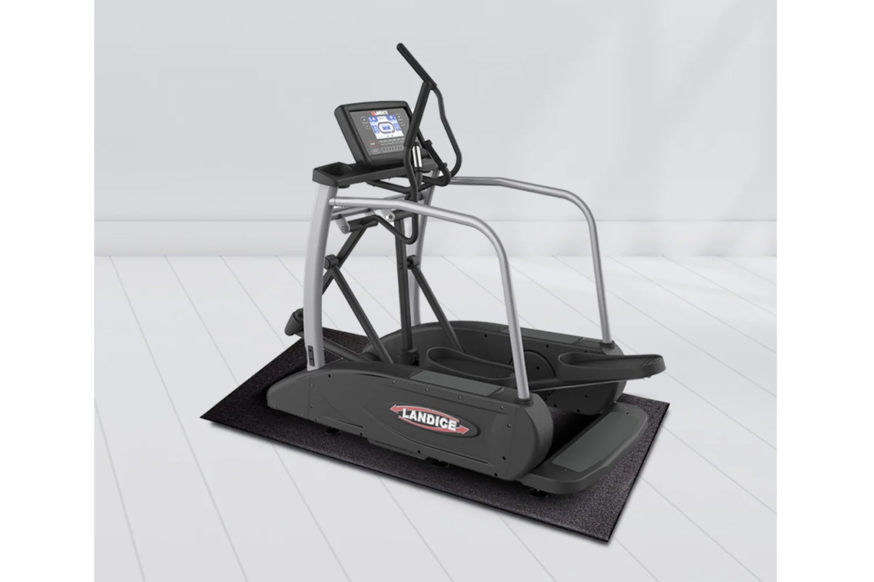 Landice E7 elliptical machine with gray frame, black pedals, digital display console, and black rubber mat on white backgroun