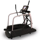 Black and silver elliptical machine with digital display console, dual black handles, and textured black foot pedals on white
