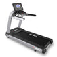 Landice L10 Club treadmill with black running belt, gray frame, black handles, and digital display console on white backgroun