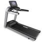 Landice L7 Club treadmill with black running deck, silver frame, black handles, and digital display console on white backgrou