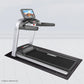 Landice L7 treadmill with silver frame, black running deck, console display showing workout content, and padded handrails on 