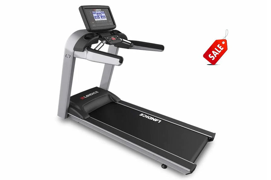 Landice L7 commercial treadmill with black running deck, silver frame, black console display, and handrails on white backgrou