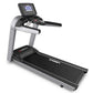 Landice L7 treadmill with black running deck, silver frame, and digital display console on white background
