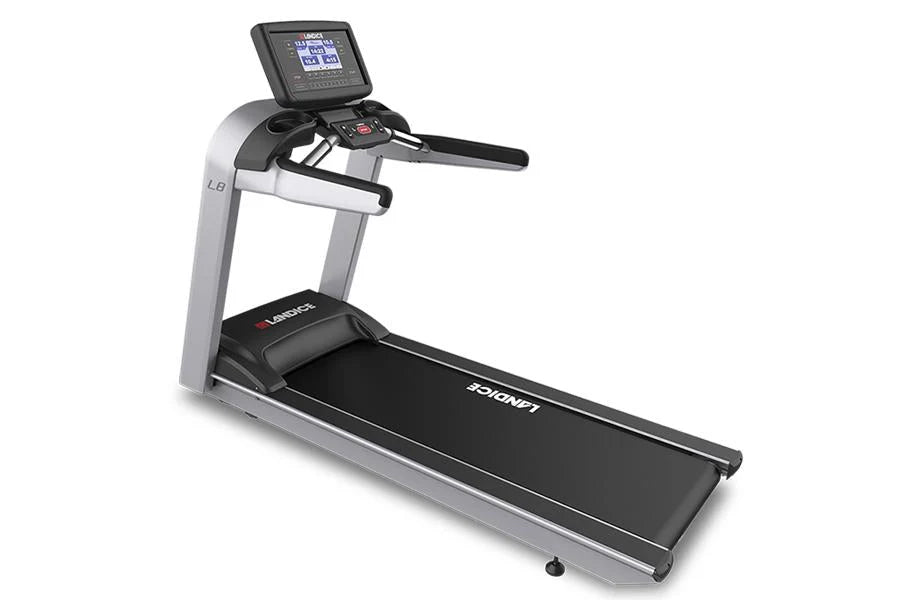Silver and black motorized treadmill with digital console display, black running deck, and stationary handlebars
