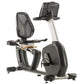 Black and gray Landice recumbent exercise bike with mesh backrest, tablet holder, and pedals, shown on white background