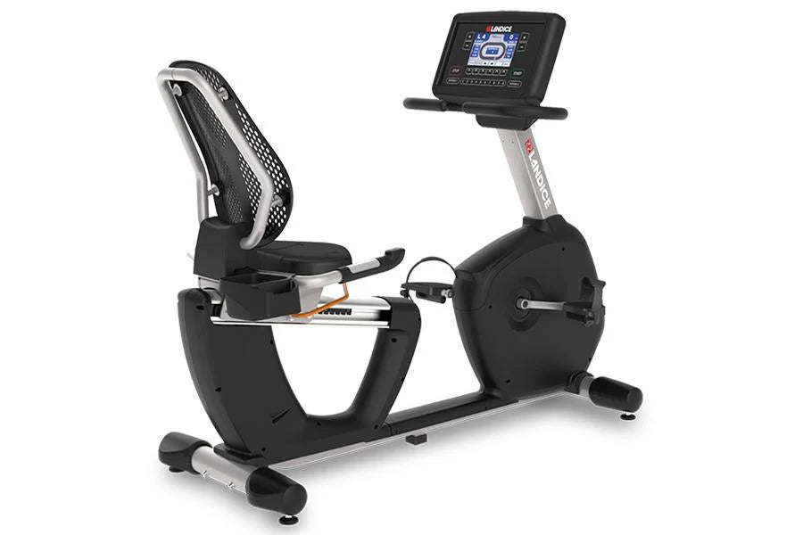 Black and silver recumbent exercise bike with digital console, mesh backrest, and foot pedals on white background